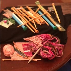 Crochet needles and some yarn of all sorts.
